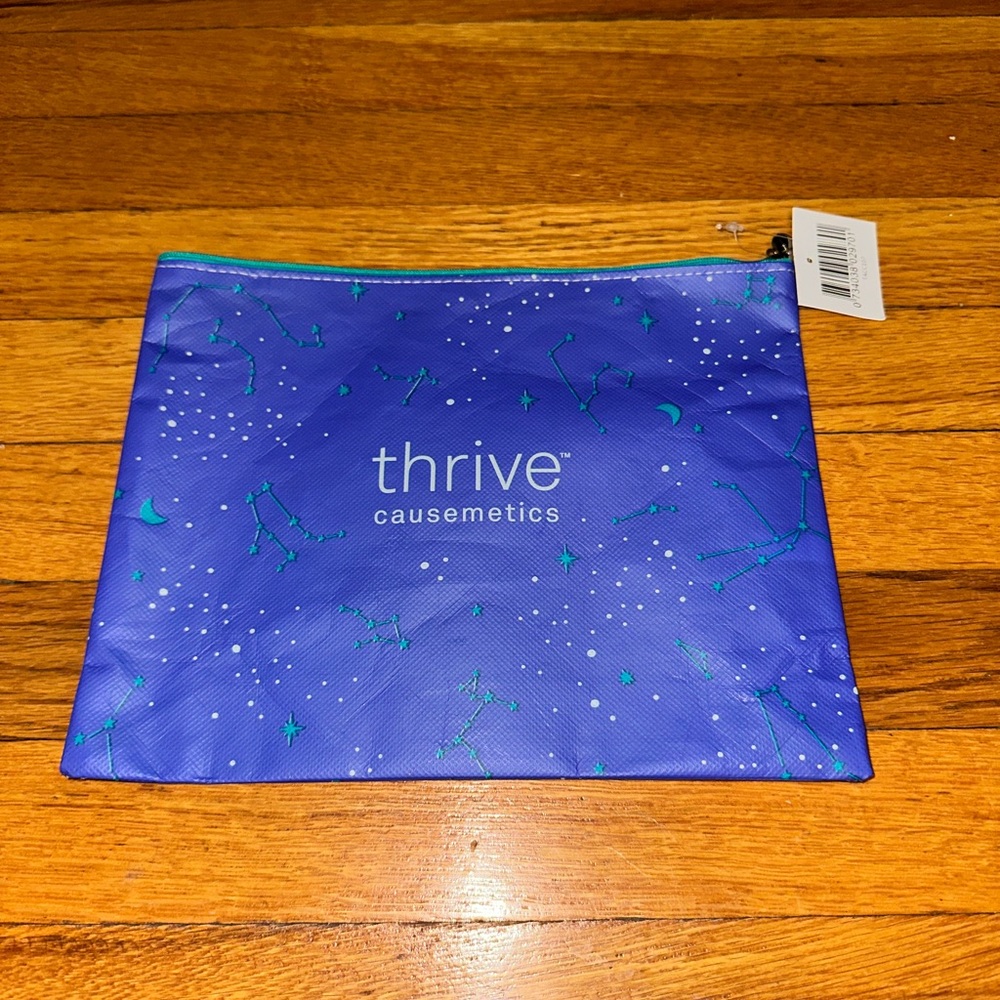 Thrive Causemetics purple and teal makeup bag!